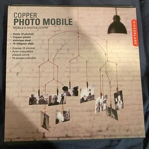 Copper Photo Mobile holds 10 photos